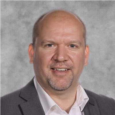 Portrait of Jason W.D. Cassidy, Founder and CEO of Shinydocs